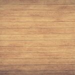 A high-resolution image of wooden planks showcasing a rustic texture, ideal for backgrounds and design use.